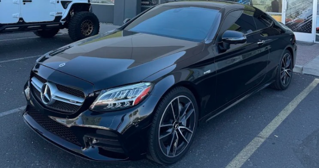 Black Mercedes-Benz C-Class coupe with ceramic window tint