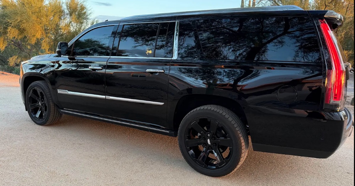 Black Cadillac Escalade with premium ceramic window tint by Mirror ImagAZ in Phoenix